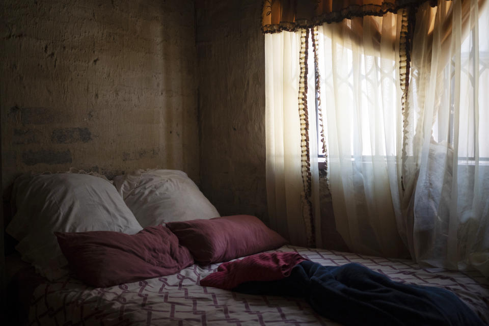 The bed that Amanda Zitho shared with her 5-year-old son Wandi is seen in their house in Orange Farm, South Africa, on Aug. 26, 2020. The boy was murdered in a suspected witchcraft ritual and his body was found in his neighbor's tavern. (AP Photo/Bram Janssen)