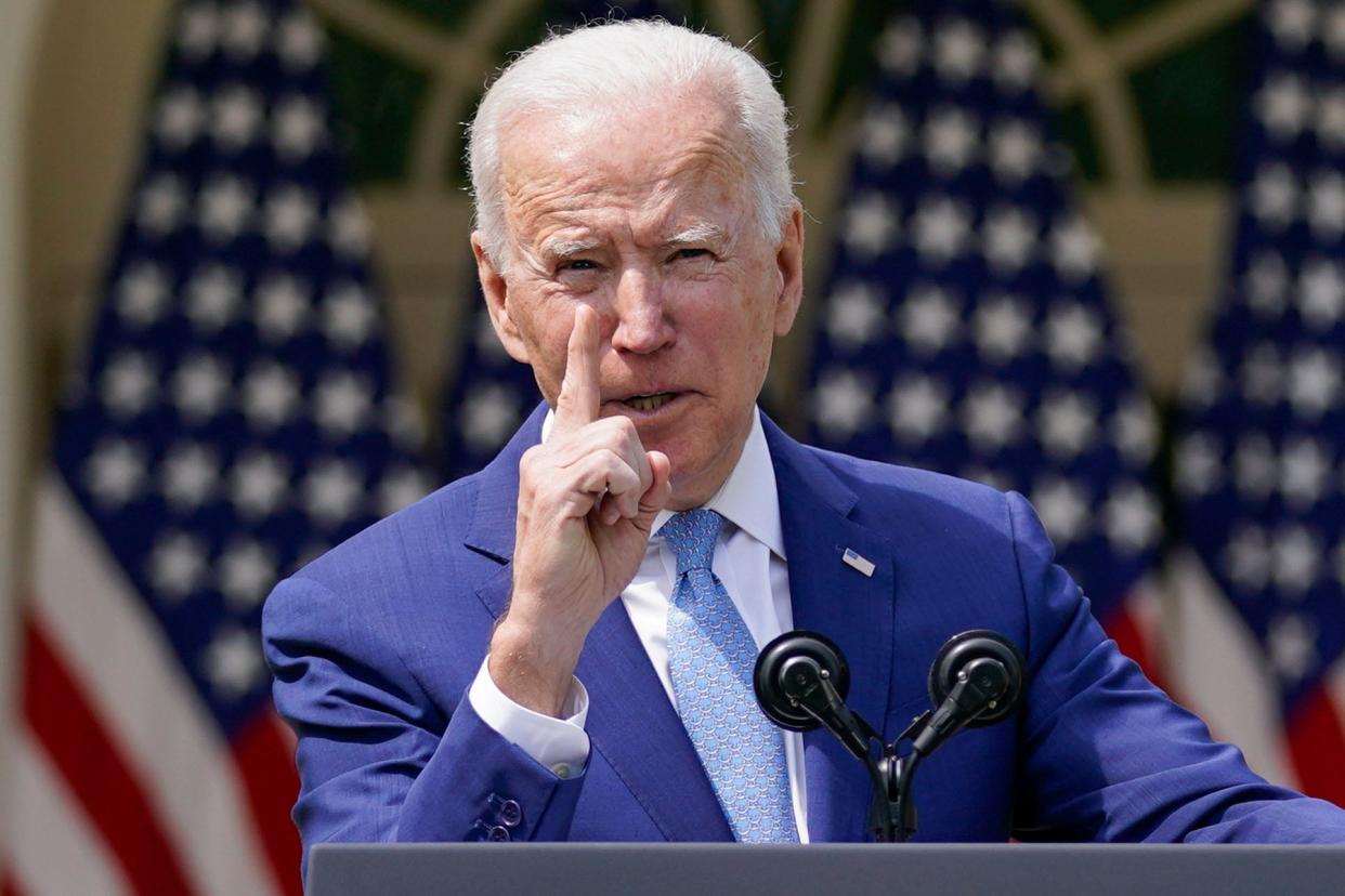 In this April 8, 2021, file photo, President Joe Biden gestures as he speaks about gun violence prevention in the Rose Garden at the White House in Washington. Biden will mark his 100th day in office on Thursday, April 29.