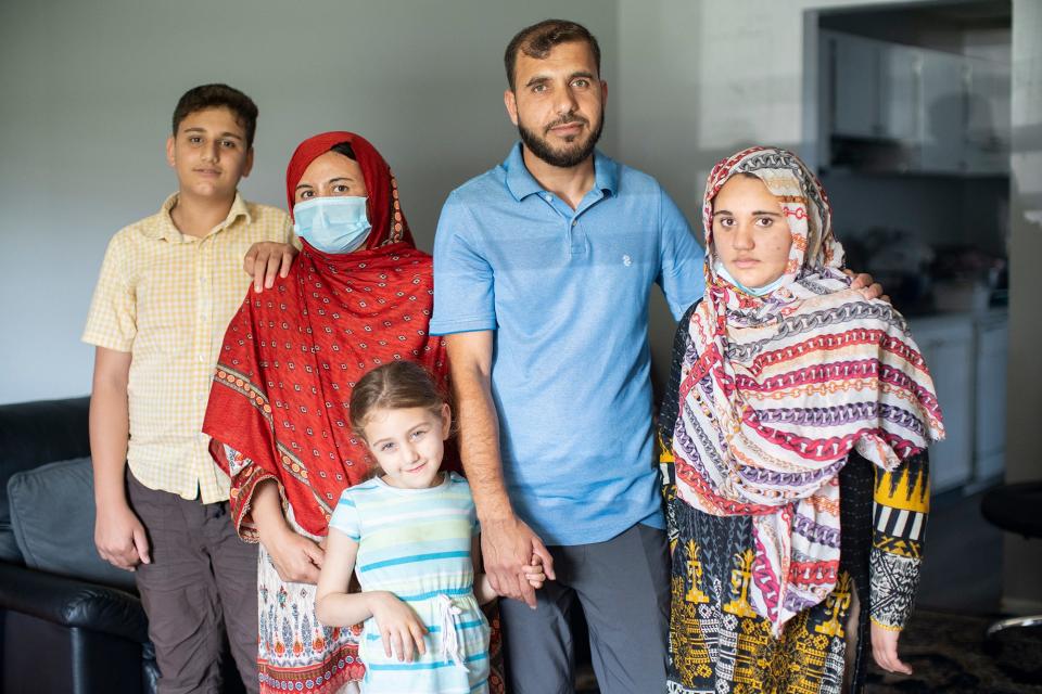 Fazlullah Mashwani, second from right, a former U.S. military translator and Afghan special forces member, moved to Columbus in 2022 to be closer to fellow Afghans. He is pictured with (from left) son Saad, wife Salma, daughter Aman and daughter Tamanni.