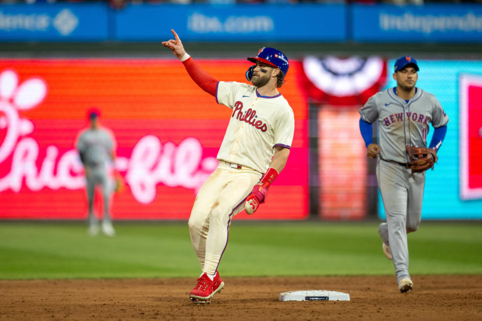 PHILADELPHIA, PA – OCTOBER 06: Philadelphia Phillies first base Bryce Harper (3) celebrates the walk-off hit during the National League Division Series game between the New York Mets and the Philadelphia Phillies on October 6, 2024 at Citizens Bank Park in Philadelphia, PA . (Photo by Terence Lewis/Icon Sportswire via Getty Images)