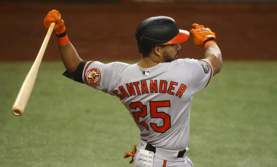Anthony Santander #25 of the Baltimore Orioles bats against the Texas Rangers at Globe Life Field in an MLB game on August 3, 2022