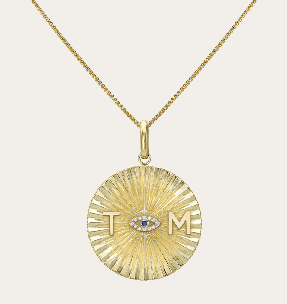 <p><a href="https://go.redirectingat.com?id=74968X1596630&url=https%3A%2F%2Fzoelev.com%2Fproducts%2F14k-gold-pleated-charm-disc-necklace%3Fvariant%3D42370438889645&sref=https%3A%2F%2F" rel="nofollow noopener" target="_blank" data-ylk="slk:Shop Now;elm:context_link;itc:0;sec:content-canvas" class="link ">Shop Now</a></p><p>14k Gold Pleated Charm Disc Necklace</p><p>zoelev.com</p><p>$700.00</p>