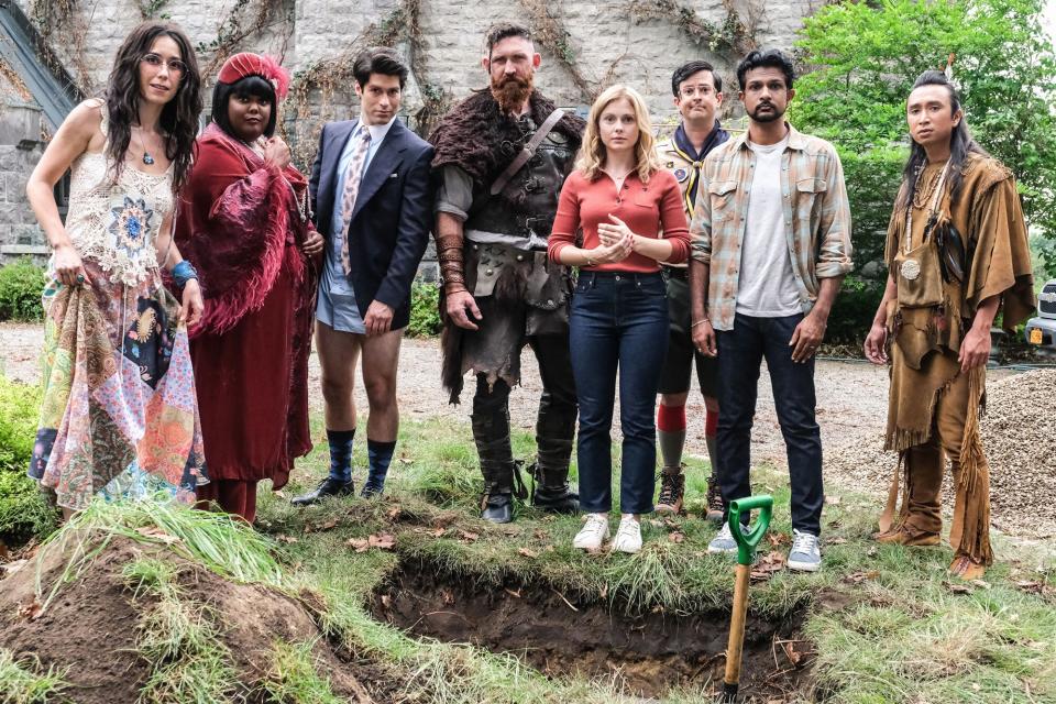 "Viking Funeral" -- When Thorfinn's bones are discovered on the Woodstone property, he asks Sam to conduct the traditional Viking funeral he's always wanted. However, Sam and Jay are torn when they learn that the bones could be sold to a museum for a lot of much-needed cash. Also, the ghosts conduct an election for a "ghost representative" to bring issues to Sam, on GHOSTS, Thursday, Oct. 14 (9:01-9:30 PM, ET/PT) on the CBS Television Network, and available to stream live and on demand on Paramount+. Pictured (L-R) Sheila Carrasco as Flower, Danielle Pinnock as Alberta, Asher Grodman as Trevor, Devan Chandler Long as Thorfinn, Rose McIver as Samantha, Richie Moriarty as Pete, Utkarsh Ambudkar as Jay and Roman Zaragoza as Sasappis