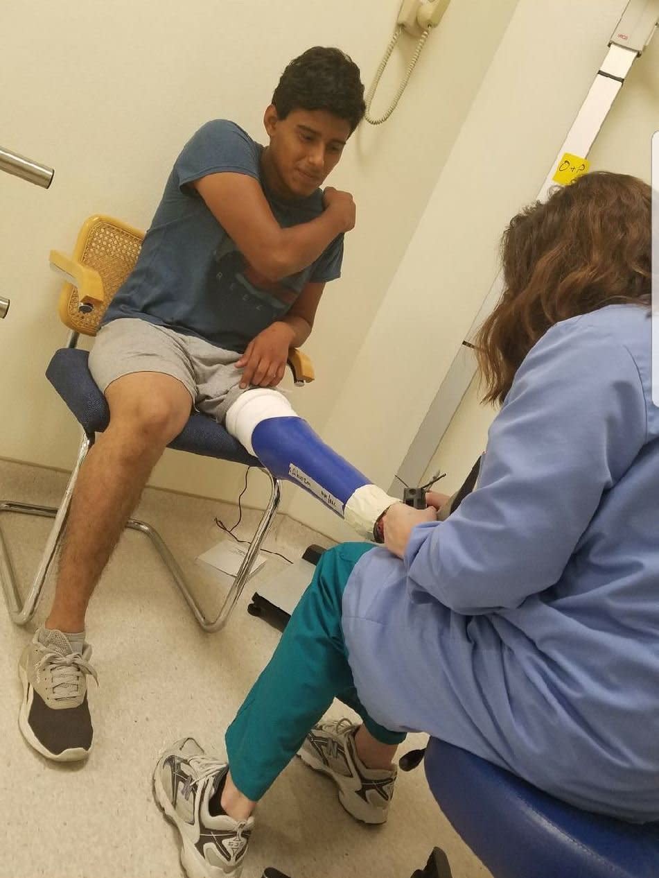 Felipe Abonza-Lopez receives assistance with his prosthetic leg in a photo taken prior to his detention.&nbsp; (Photo: Courtesy of RAICES)