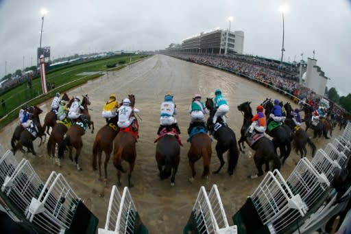 Despite a muddy track that absorbed a Derby-day record three inches of rain and intense downpours as horses were loaded into the starting gates, Justify broke well, starting seventh from the rail