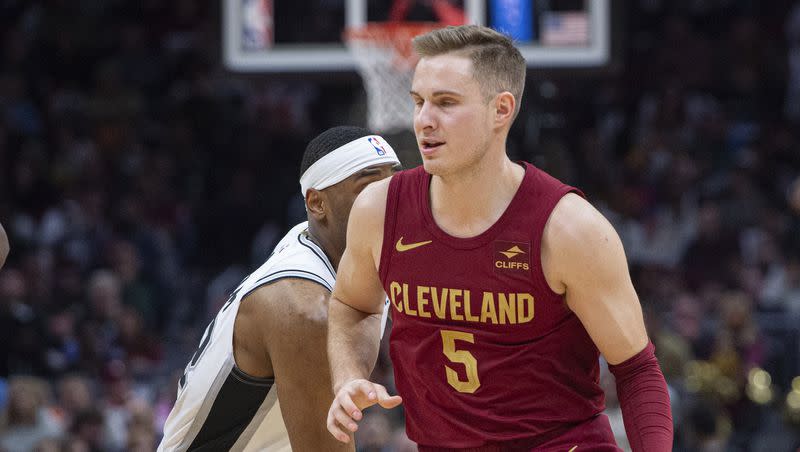 Cleveland Cavaliers’ Sam Merrill (5) plays against the San Antonio Spurs during an NBA basketball game in Cleveland on Sunday, Jan. 7, 2024.