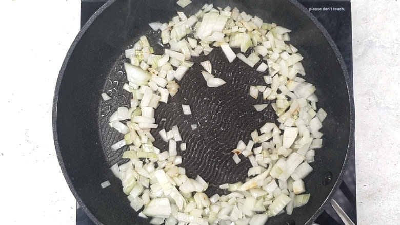 Frying onions in pan