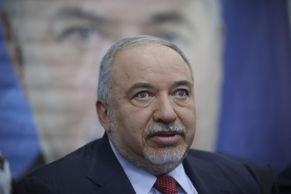 FILE - In this May 30, 2019 file photo, Former Israeli Defense Minister and Yisrael Beiteinu party leader Avigdor Lieberman speaks to journalists during a press conference in Tel Aviv, Israel. Israel embarked on an unprecedented second, snap election this year after Prime Minister Benjamin Netanyahu failed to form a governing coalition and instead dissolved parliament. Netanyahu was unable to build a parliamentary majority because his traditional ally, Lieberman, refused to bring his faction into the coalition. (AP Photo/Oded Balilty, File)