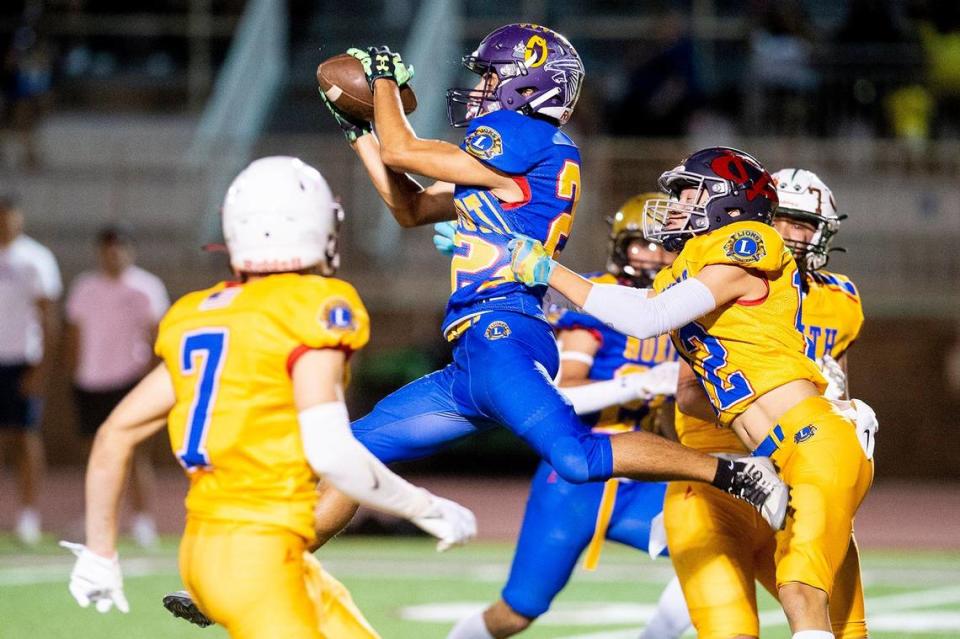 North All-Star Drew Felber (24) representing Orestimba, catches a pass during the Merced County All-Star Football Game at Golden Valley High School in Merced, Calif., on Saturday, June 15, 2024. The South All-Stars beat the North All-Stars 33-20.