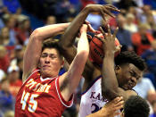 <p>Pittsburg State forward Jonathan Murray (45) rebounds against Kansas center Udoka Azubuike, right, during the first half of an exhibition NCAA college basketball game in Lawrence, Kan., Tuesday, Oct. 31, 2017. (AP Photo/Orlin Wagner) </p>