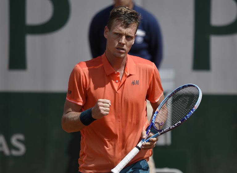 Czech Republic's Tomas Berdych took less than half an hour to win the opening set against Yoshihito Nishioka (unseen)