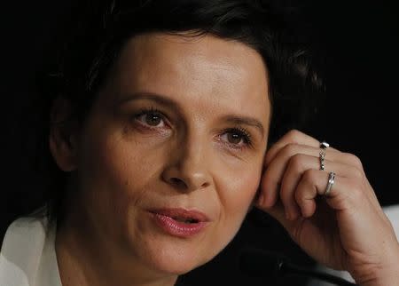 Cast member Juliette Binoche attends a news conference for the film "Sils Maria" (Clouds of Sils Maria) in competition at the 67th Cannes Film Festival in Cannes May 23, 2014. REUTERS/Eric Gaillard