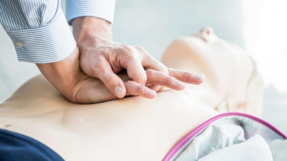 PHOTO: In an undated stock photo, a person practices chest compressions on a CPR training dummy. (STOCK PHOTO/Getty Images)