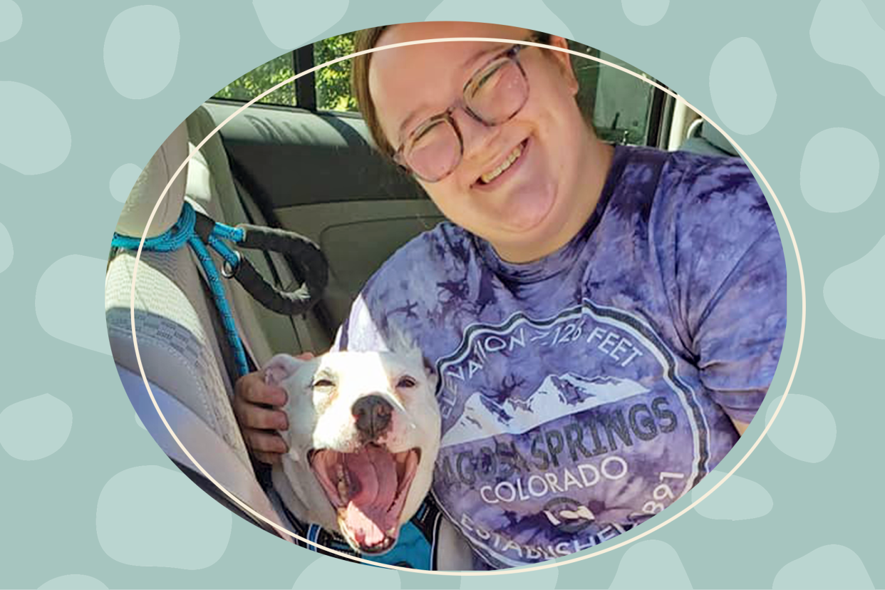 woman with dog she adopted after he was in a shelter for 10 years