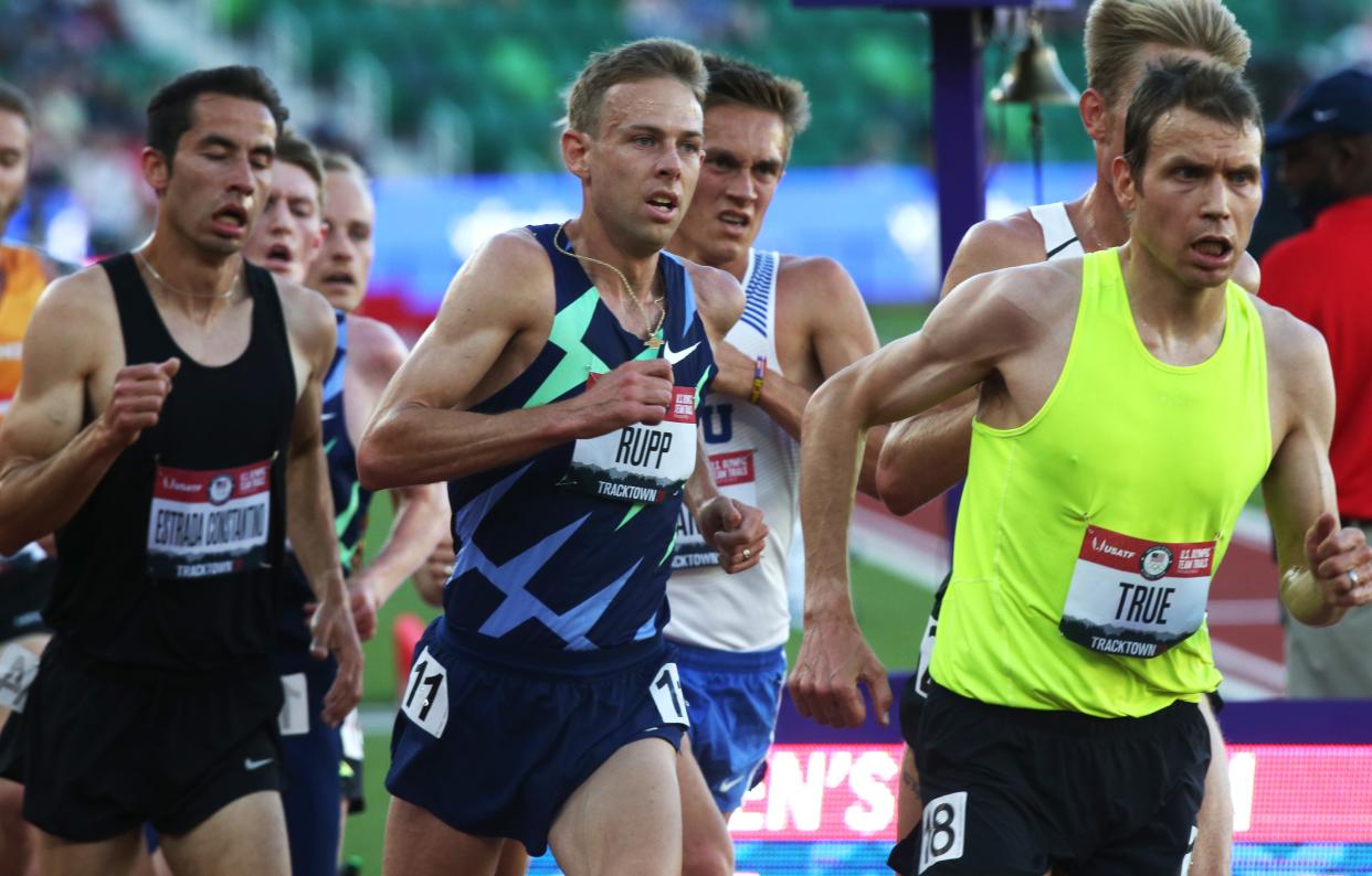 Galen Rupp, center, runs with the pack during the final laps of the men's 10,000 meters at this year's U.S. Olympic Trials at Hayward Field.