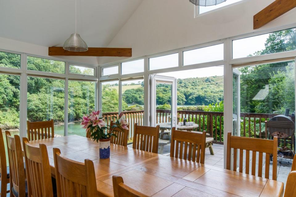 The dining room, opening out onto the terrace (Strutt & Parker)