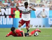 Soccer Football - World Cup - Group F - South Korea vs Mexico - Rostov Arena, Rostov-on-Don, Russia - June 23, 2018 Mexico's Carlos Vela in action with South Korea's Ju Se-jong REUTERS/Marko Djurica