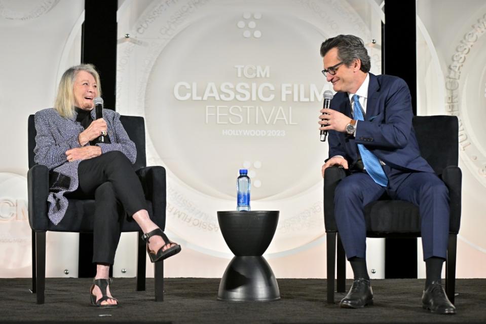 HOLLYWOOD, CALIFORNIA - APRIL 13: (L-R) Angie Dickinson and TCM host Ben Mankiewicz speak onstage during the opening night gala and world premiere of the 4k restoration of "Rio Bravo" during the 2023 TCM Classic Film Festival at TCL Chinese Theatre on April 13, 2023 in Hollywood, California. (Photo by Charley Gallay/Getty Images for TCM)