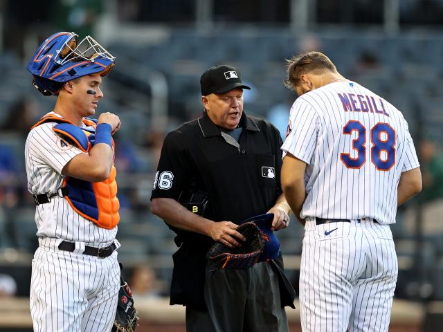 Mets fans' applause for Tylor Megill turns to boos for umpire as pitcher  gets inspected