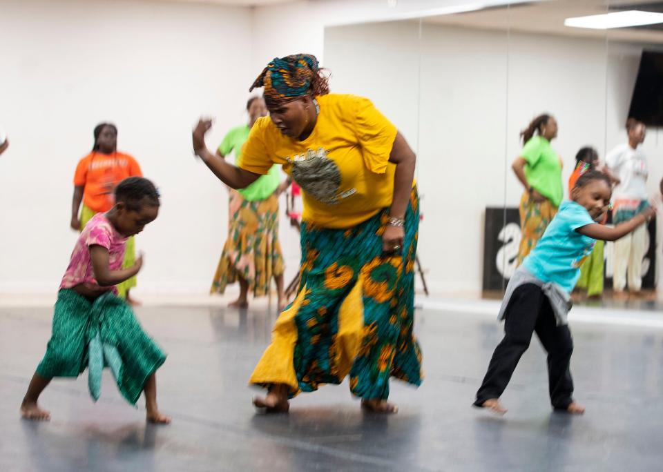 Dancers groove to live percussion music as the Ayoka Afrikan Drum and Dance Incorporation rehearses on Monday, Feb. 6, 2023 in Tallahassee, Fla. 