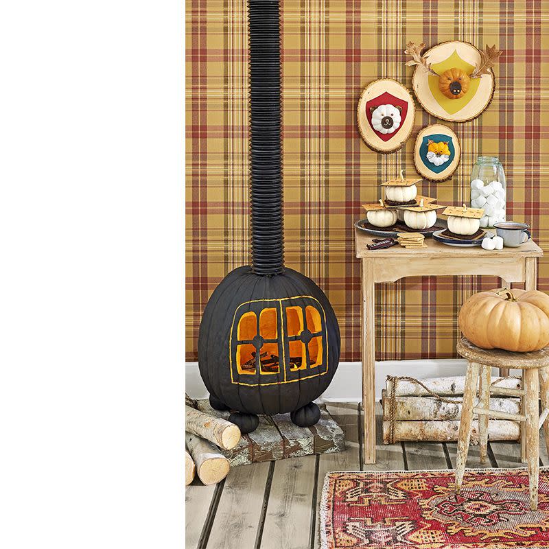 <p>Something about this is so cozy! This DIY stove pumpkin is right up your alley if you're looking for something more challenging to do this year.</p><p><em><a href="http://clv.h-cdn.co/assets/downloads/1504026989_-_pumpkin-templates-2017.pdf" rel="nofollow noopener" target="_blank" data-ylk="slk:Get the Wood-Burning Stove stencil.;elm:context_link;itc:0;sec:content-canvas" class="link "><strong>Get the Wood-Burning Stove stencil.</strong></a></em></p>