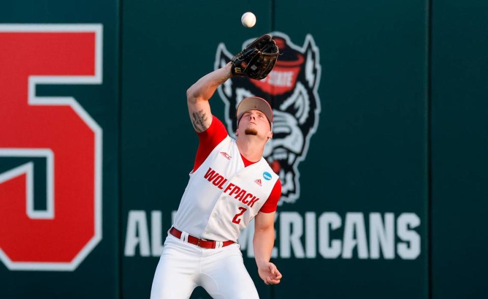 N.C. State’s Noah Soles (2) catches a fly ball during N.C. State’s game against Bryant in the NCAA Raleigh Regional at Doak Field Friday, May 31, 2024.