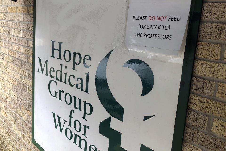 A sign outside the Hope Medical Group for Women in Shreveport, La., on Feb. 20, 2020 asks people not to speak to or feed protesters. The clinic is one of three in the state that provides abortions to women, and it is challenging a state law that requires doctors who perform abortions to have admitting privileges at a nearby hospital. The Supreme Court is hearing the case on March 4. (CREDIT: Rebecca Santana)