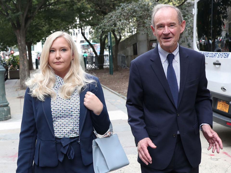 Lawyer David Boies arrives with his client Virginia Giuffre for hearing in the criminal case against Jeffrey Epstein, who died this month in what a New York City medical examiner ruled a suicide, at Federal Court in New York, U.S., August 27, 2019.