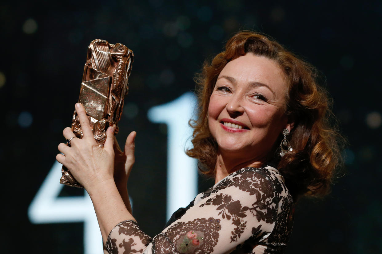 French actress Catherine Frot poses on stage with her trophy after she won the Best Actress award for "Marguerite" during the 41st edition of the Cesar Ceremony at the Theatre du Chatelet in Paris on February 26, 2016.   AFP PHOTO / PATRICK KOVARIK / AFP / PATRICK KOVARIK        (Photo credit should read PATRICK KOVARIK/AFP via Getty Images)