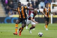 Britain Soccer Football - Hull City v West Ham United - Premier League - The Kingston Communications Stadium - 1/4/17 Hull City's Alfred N'Diaye in action with West Ham United's Sofiane Feghouli Action Images via Reuters / Ed Sykes Livepic