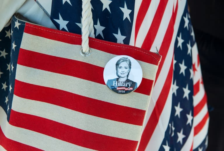 A pin is seen attached to an attendee's tote bag before the start of a campaign event for Democratic presidential candidate Hillary Clinton in Reno, Nevada on August 25, 2016