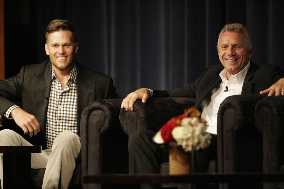 Idol offers advice: Joe Montana, right, said Tom Brady shouldn't leave the New England Patriots if he doesn't have to. (Gary Reyes/Bay Area News Group/Getty Images)