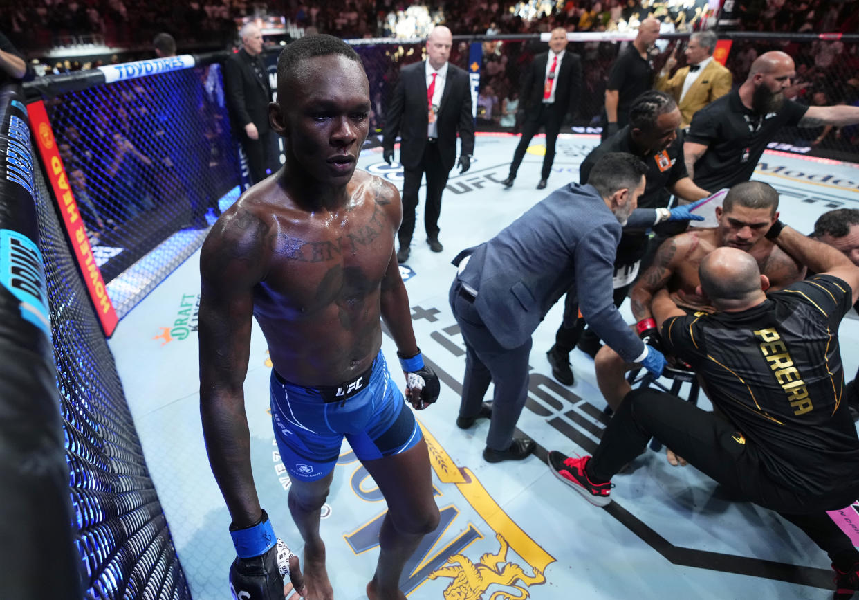 MIAMI, FLORIDA - APRIL 08: Israel Adesanya of Nigeria reacts after knocking out Alex Pereira of Brazil in the UFC middleweight championship fight during the UFC 287 event at Kaseya Center on April 08, 2023 in Miami, Florida. (Photo by Jeff Bottari/Zuffa LLC via Getty Images)
