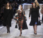 From left, Dominik, Daniella and Alessandra Garcia-Lorido daughters of actor Andy Garcia wear creations for Dolce&Gabbana women's Fall-Winter 2017-18 collection, in Milan, Italy, Sunday, Feb. 26, 2017. (AP Photo/Luca Bruno).