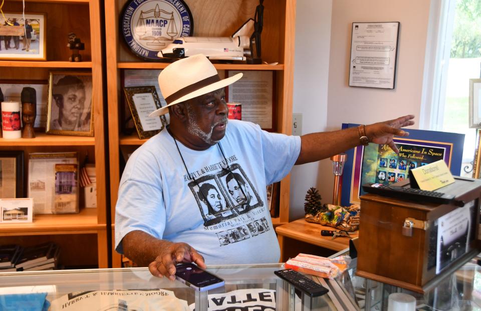 Bill Gary, President, Board of Directors for the Moore Cultural Complex in Mims, in the gift shop at the center.