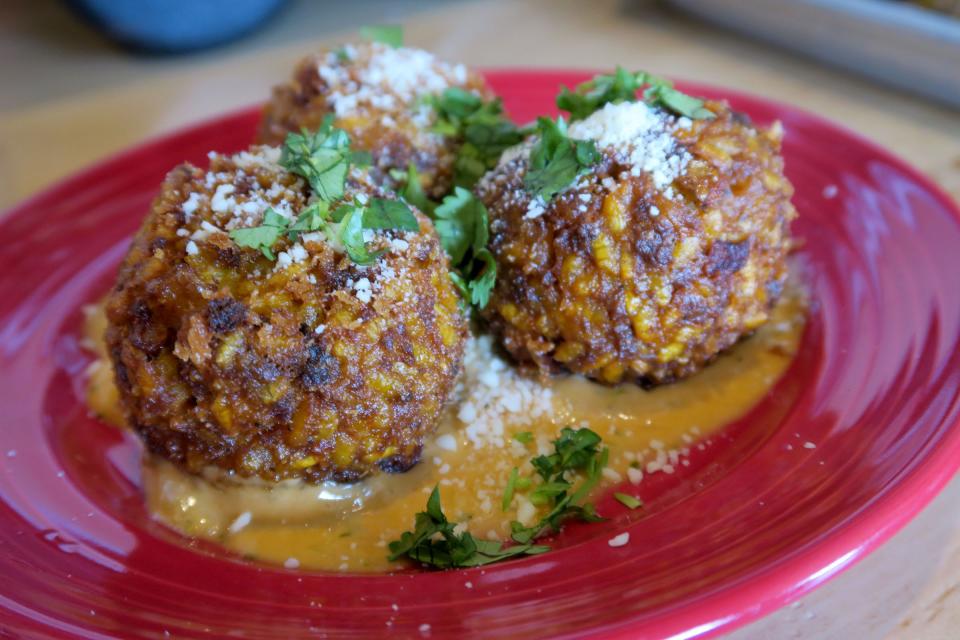 Arizona arancini (Spanish-style risotto with chorizo and cotija cheese, breaded and fried with chipotle mayo) at Pinto's Porch on East Bay Avenue in Manahawkin.