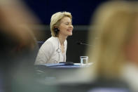 Ursula von der Leyen, the candidate to succeed Jean-Claude Juncker as head of the EU executive, smiles during a debate at the European Parliament in Strasbourg, eastern France, Tuesday July 16, 2019. Ursula von der Leyen is seeking to woo enough legislators at the European Parliament to secure the job of European Commission President in a secret vote late Tuesday. (AP Photo/Jean-Francois Badias)