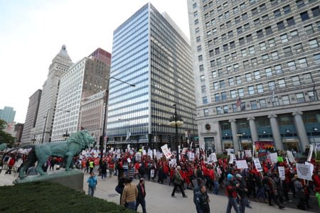 Teachers protest during a rally and march on the first day of a teacher strike in Chicago