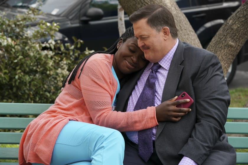 Folake Olowofoyeku and Billy Gardell in "Bob Hearts Abishola" on CBS.