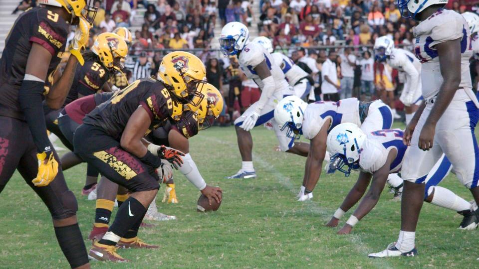 Pahokee and Glades Central players lineup before a play during the 2019 Muck Bowl. An eight-episode documentary series &#8220;4th and Forever: Muck City&#8221; comes out Thursday and chronicles the 2019 seasons for Pahokee and Glades Central football.