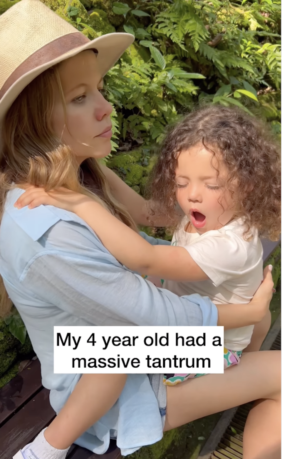 Tammin Sursok pictured helping her daughter through a tantrum. 