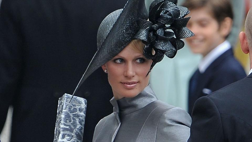 Zara Phillips (C) and Mike Tindall arrive to attend the Royal Wedding of Prince William to Catherine Middleton at Westminster Abbey on April 29, 2011 in London, England.