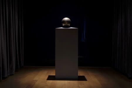 An urn containing the ashes of Serbian-American inventor Nikola Tesla stands on a pedestal in his museum in Belgrade, Serbia, June 2, 2016. REUTERS/Marko Djurica