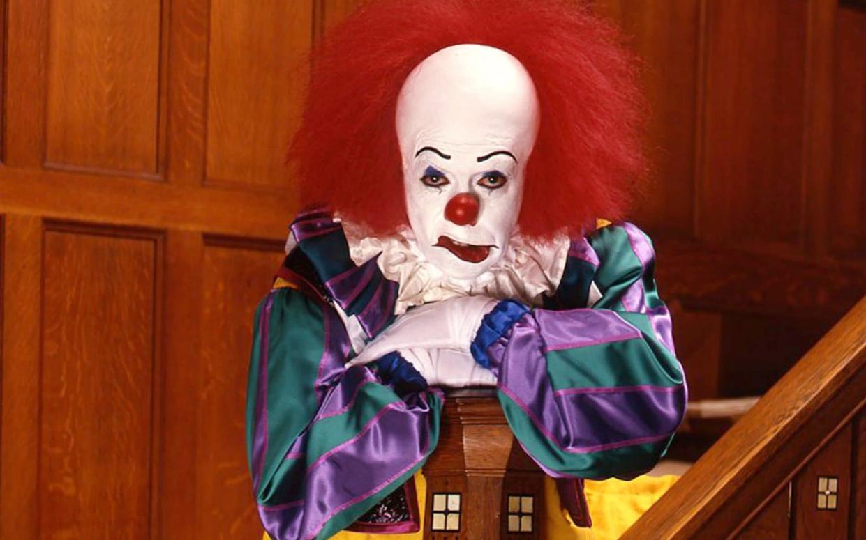 Tim Curry as Pennywise in the 1990 mini-series of Stephen King's IT - Walt Disney Television