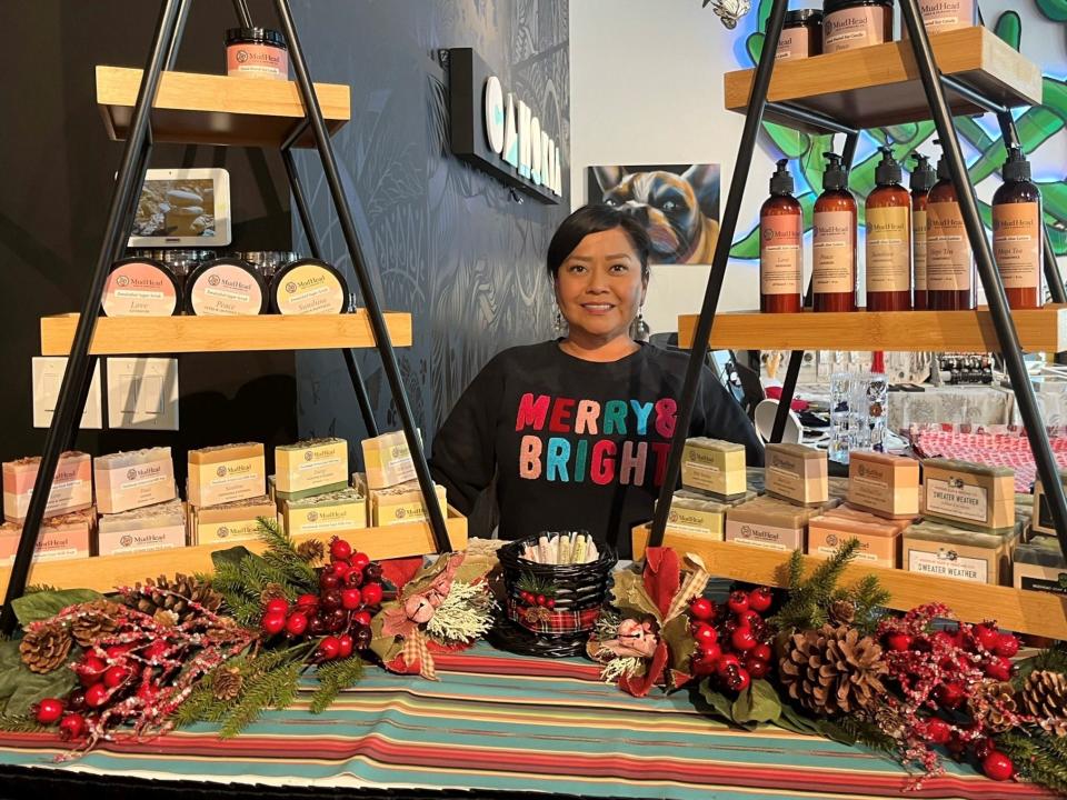 Teresa Ami, owner and operator of MudHead Soap & Skincare Company, at the pop-up market at Cahokia SocialTech & Art Space in downtown Phoenix on Nov. 25, 2023.