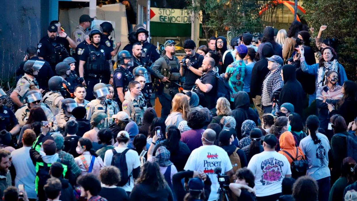 PHOTO: Pro-Palestinian protesters stand off with police on the campus of California State Polytechnic University, Humboldt, in Arcata, Calif., April 22, 2024. (Andrew Goff/AP)