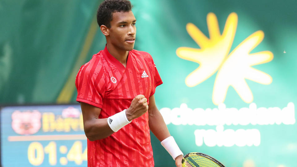 Felix Auger-Aliassime, pictured here after beating Roger Federer in Halle.