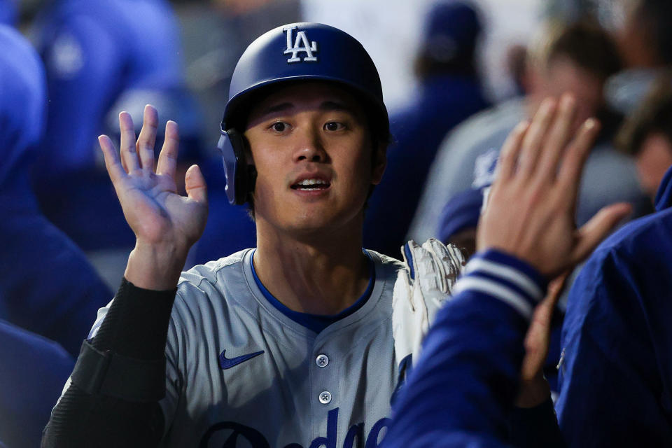 MINNEAPOLIS, MINNESOTA - APRIL 8: Shohei Ohtani #17 of the Los Angeles Dodgers celebrates after scoring from a base hit by Will Smith #16 against the Minnesota Twins during the sixth inning at Target Field on April 8, 2024 in Minneapolis, Minnesota. (Photo by Matt Krohn/Getty Images)