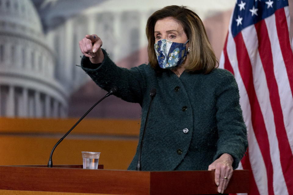 House Speaker Nancy Pelosi of Calif. calls on a reporter at a news conference on Capitol Hill in Washington, Thursday, Jan. 28, 2021. (AP Photo/Andrew Harnik)