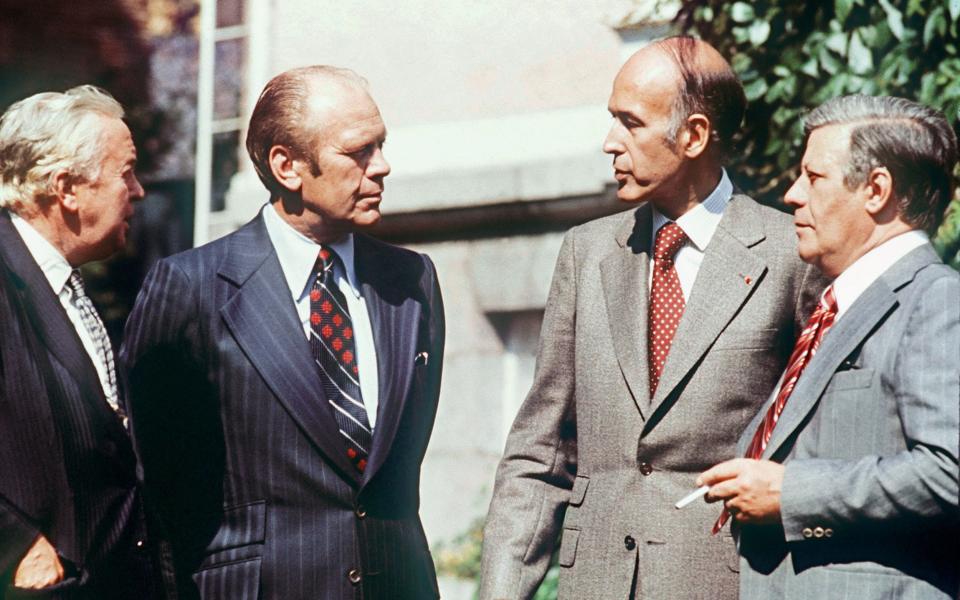 Giscard with Harold Wilson, Gerald Ford and Schmidt in Helsinki in 1975. The meetings were his initiative and would later evolve into the G7 - GETTY IMAGES